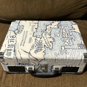 Victrola Vintage Suitcase Record Player in world map